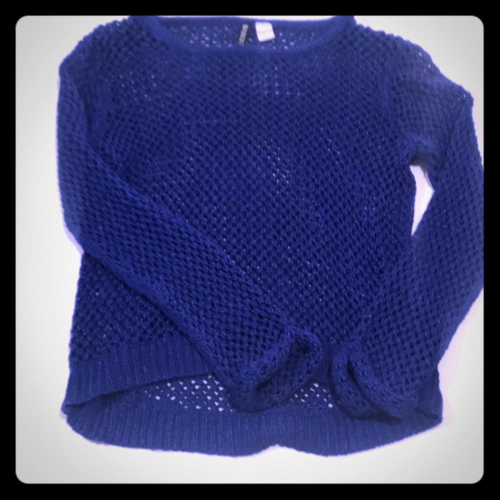 Blue crocheted sweater.